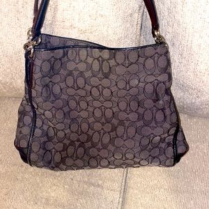 Vintage authentic coach bag with three large separate pockets with zipper access